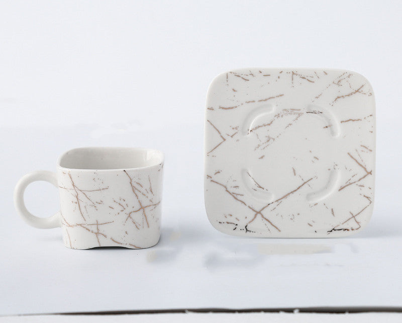 NORDIC EDGE ceramic teacups + teapot with warming seat.