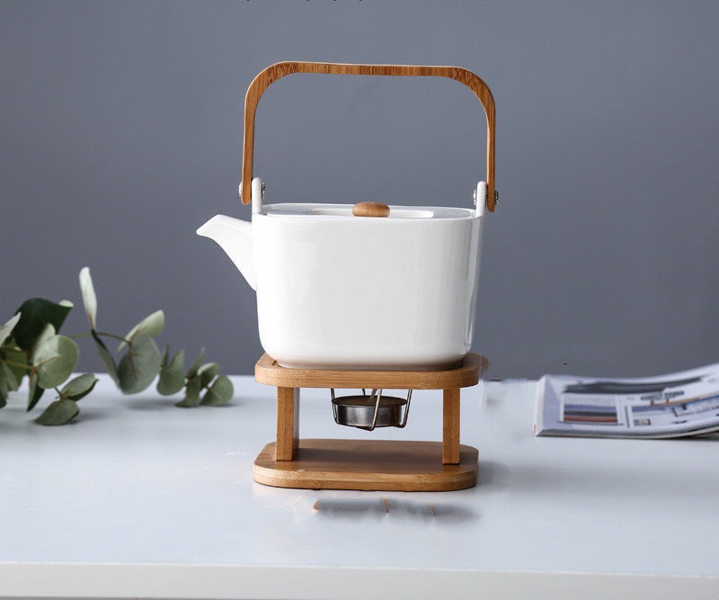 NORDIC EDGE ceramic teacups + teapot with warming seat.