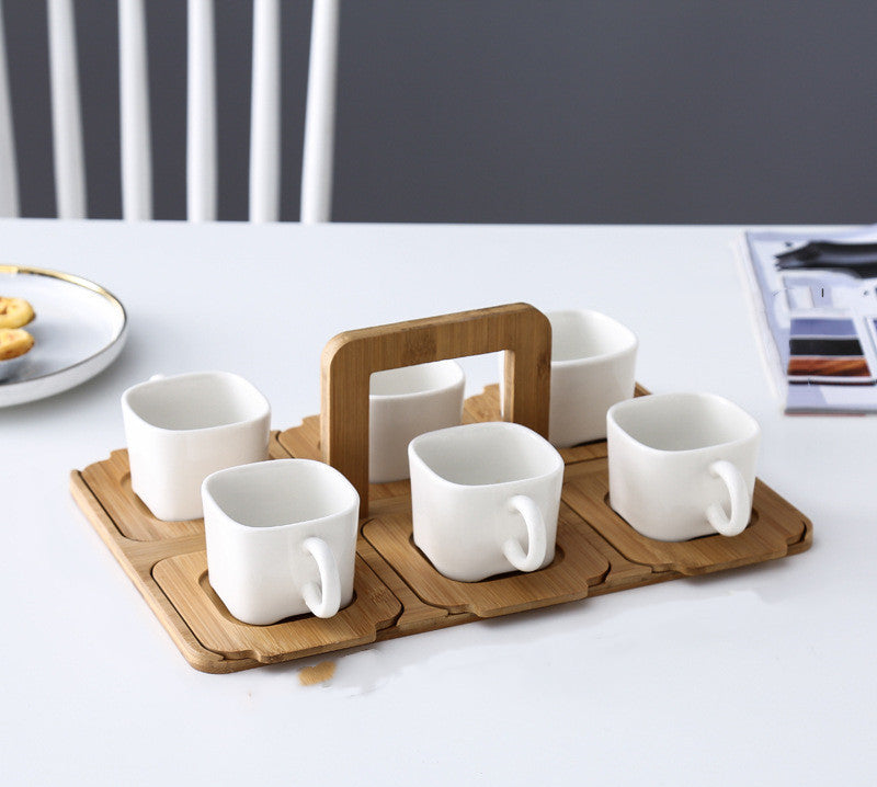 NORDIC EDGE ceramic teacups + teapot with warming seat.