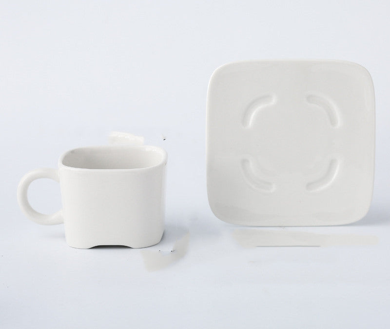 NORDIC EDGE ceramic teacups + teapot with warming seat.