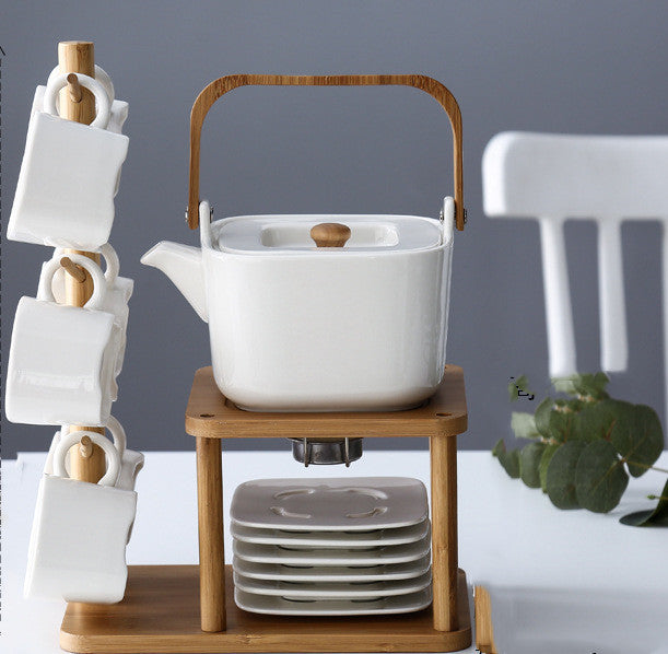 NORDIC EDGE ceramic teacups + teapot with warming seat.