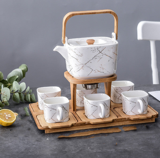 NORDIC EDGE ceramic teacups + teapot with warming seat.