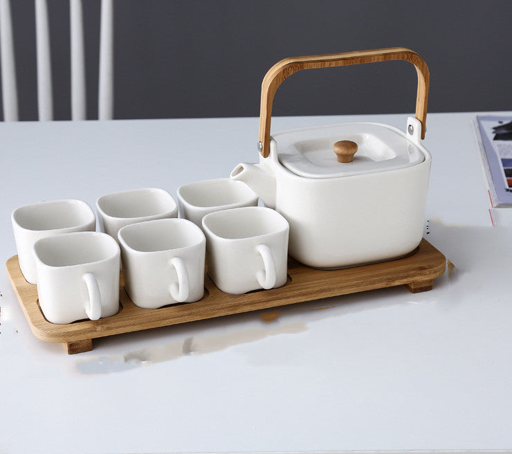 NORDIC EDGE ceramic teacups + teapot with warming seat.