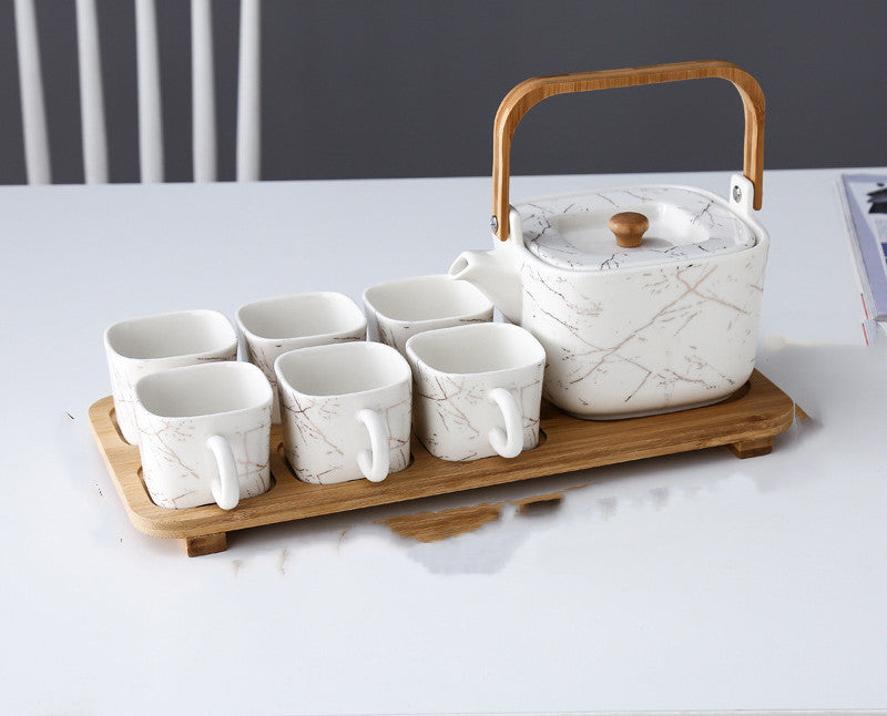 NORDIC EDGE ceramic teacups + teapot with warming seat.