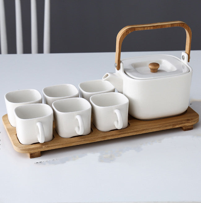 NORDIC EDGE ceramic teacups + teapot with warming seat.