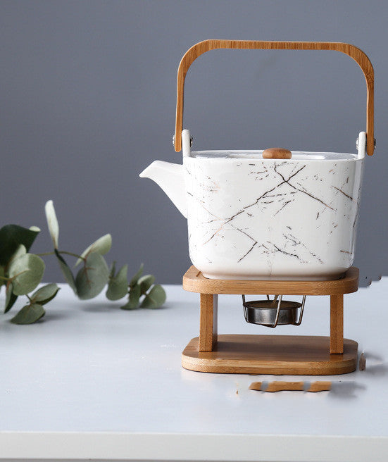 NORDIC EDGE ceramic teacups + teapot with warming seat.